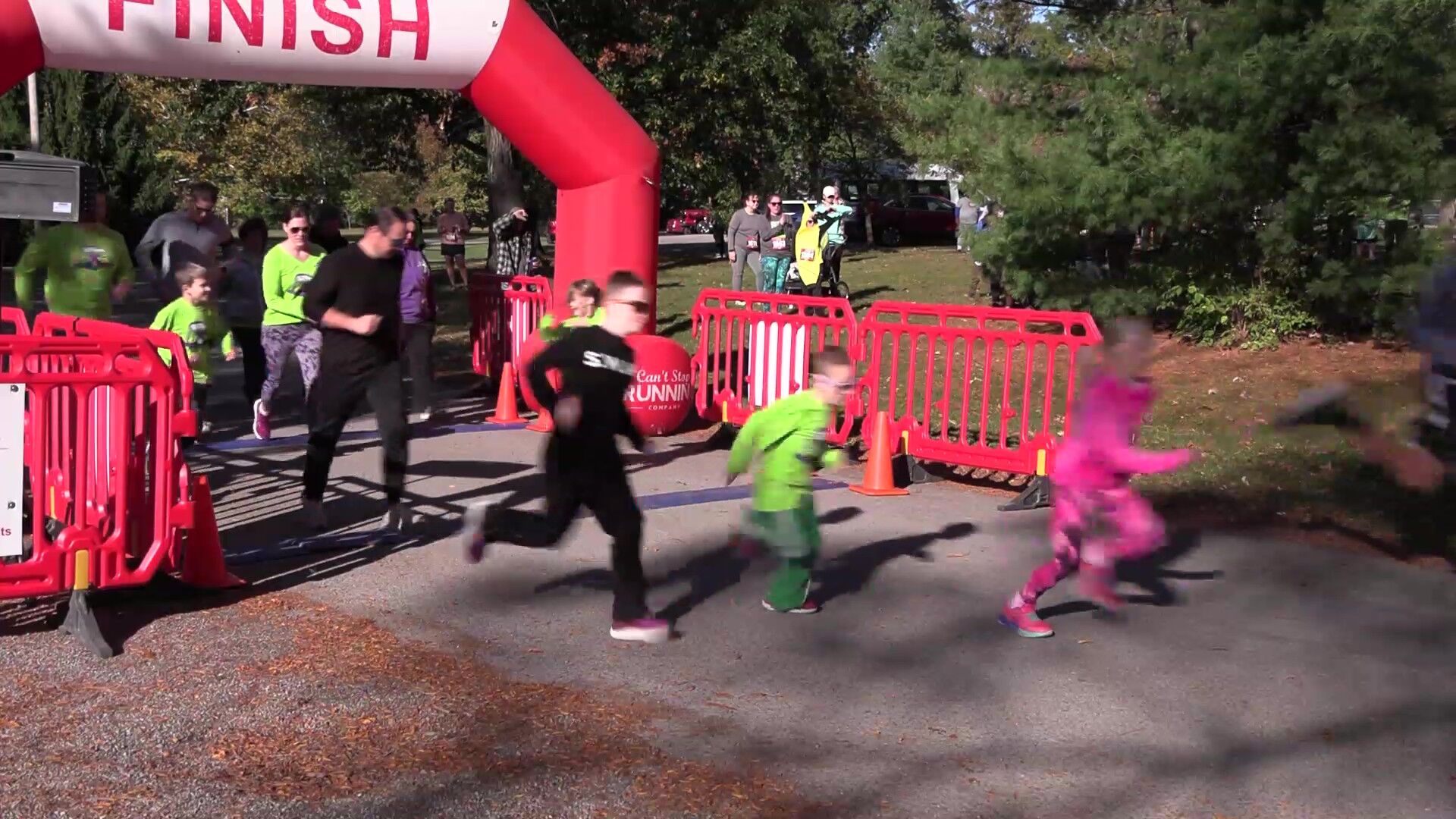 Runners race through Woodlawn Cemetery for Kiwanis Club’s Howl’oween Trick or Trot
